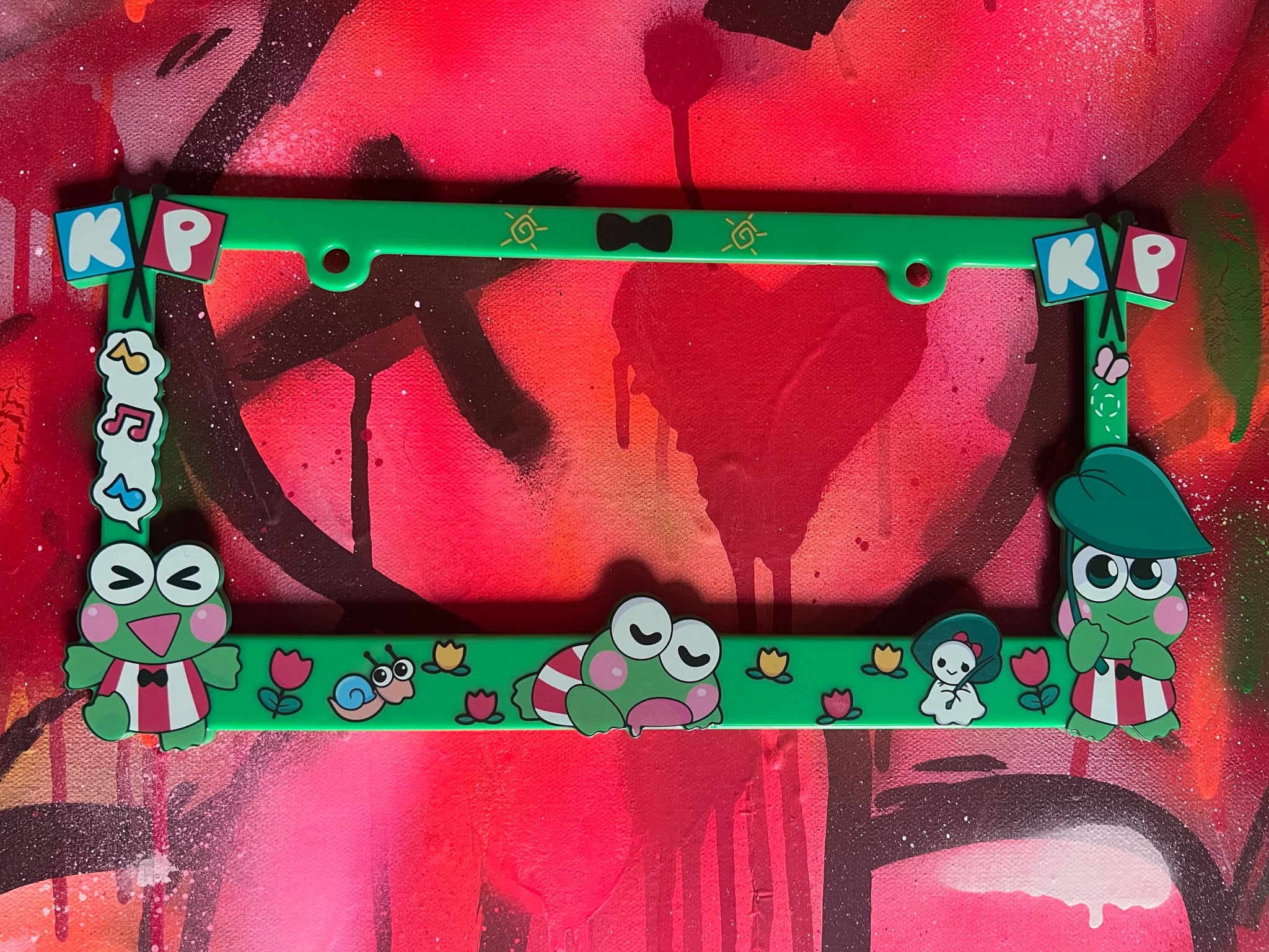 Froggy license plate frame